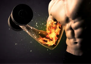 Image of man doing a bicep curl exercises with fire on his arm representing explosive bicep exercises