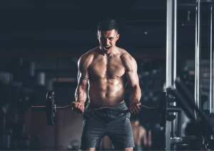 Image of a man working out with a barbell. Showing gym marketing ideas