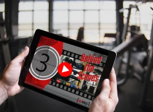 Image of a gym member watching fitness videos