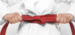 Image of a red Taekwondo belt representing one of the Taekwondo belt levels and ranking system