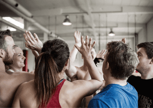 Image of Hyrox gym members high-fiving