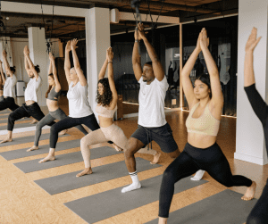 Image of a gym class which helps gym retention