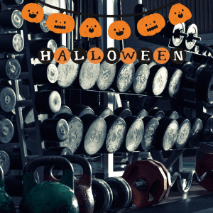 Image of gym halloween decor in front of weights 