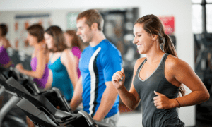 Image of a busy and full gym which can be minimized by 2026 gym management software